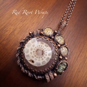 Ammonite, Fossil Coral, and Carved Labradorite Skull Necklace in Copper